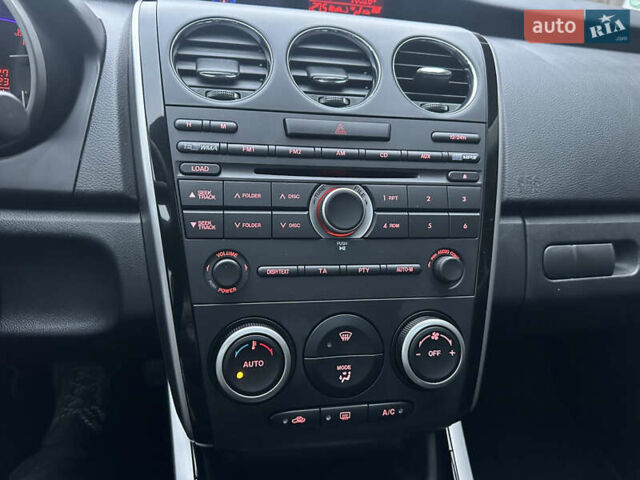 Білий Мазда СХ-7, об'ємом двигуна 2.2 л та пробігом 243 тис. км за 10999 $, фото 46 на Automoto.ua