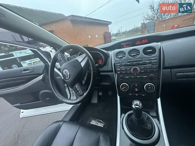 Білий Мазда СХ-7, об'ємом двигуна 2.2 л та пробігом 243 тис. км за 10999 $, фото 37 на Automoto.ua