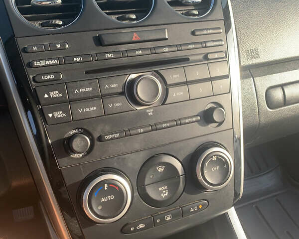 Белый Мазда СХ-7, объемом двигателя 2.2 л и пробегом 185 тыс. км за 9500 $, фото 18 на Automoto.ua