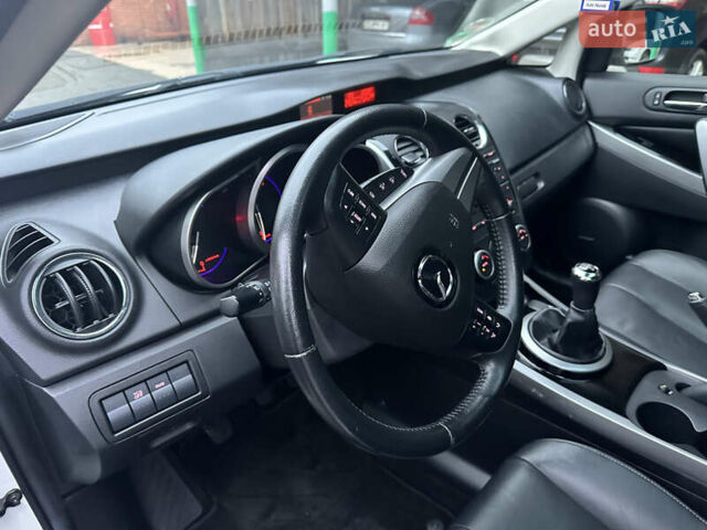 Білий Мазда СХ-7, об'ємом двигуна 2.2 л та пробігом 243 тис. км за 10999 $, фото 28 на Automoto.ua