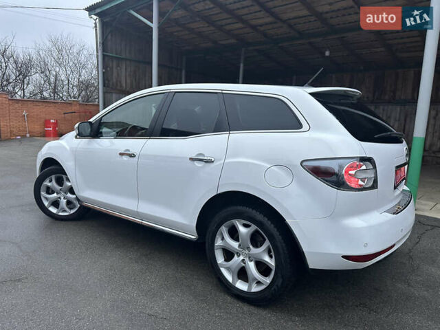 Білий Мазда СХ-7, об'ємом двигуна 2.2 л та пробігом 243 тис. км за 10999 $, фото 16 на Automoto.ua