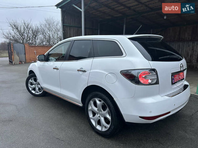 Білий Мазда СХ-7, об'ємом двигуна 2.2 л та пробігом 243 тис. км за 10999 $, фото 15 на Automoto.ua