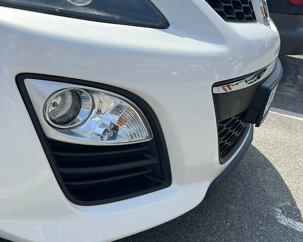 Белый Мазда СХ-7, объемом двигателя 2.2 л и пробегом 230 тыс. км за 8900 $, фото 11 на Automoto.ua