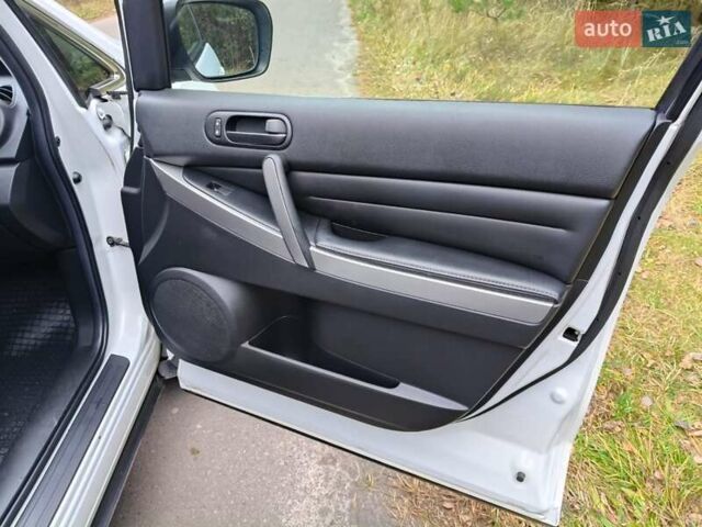 Белый Мазда СХ-7, объемом двигателя 2.18 л и пробегом 168 тыс. км за 10600 $, фото 32 на Automoto.ua