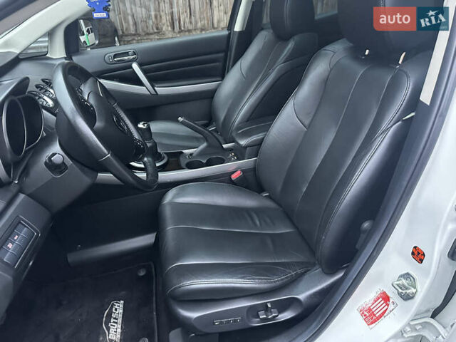 Білий Мазда СХ-7, об'ємом двигуна 2.2 л та пробігом 243 тис. км за 10999 $, фото 29 на Automoto.ua