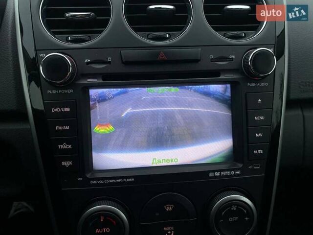 Білий Мазда СХ-7, об'ємом двигуна 2.3 л та пробігом 218 тис. км за 7990 $, фото 39 на Automoto.ua