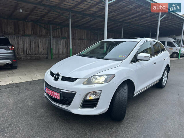 Білий Мазда СХ-7, об'ємом двигуна 2.2 л та пробігом 243 тис. км за 10999 $, фото 24 на Automoto.ua