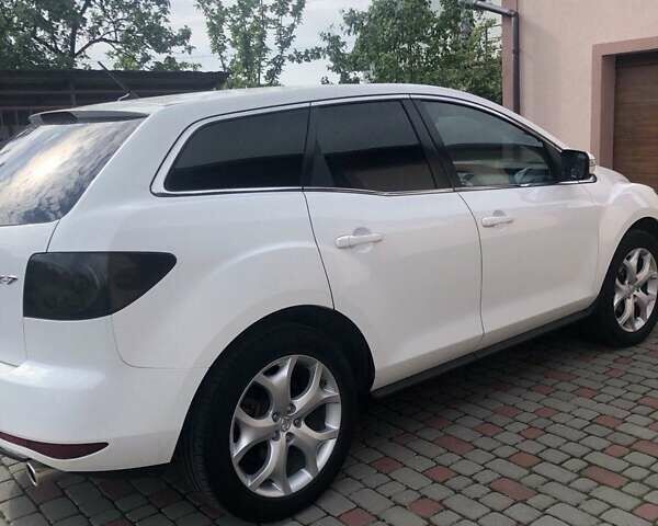 Белый Мазда СХ-7, объемом двигателя 2.49 л и пробегом 209 тыс. км за 10600 $, фото 20 на Automoto.ua