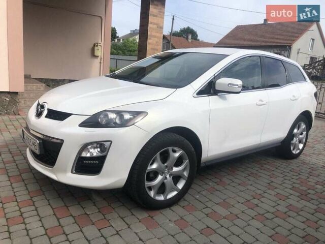 Белый Мазда СХ-7, объемом двигателя 2.49 л и пробегом 209 тыс. км за 10600 $, фото 21 на Automoto.ua