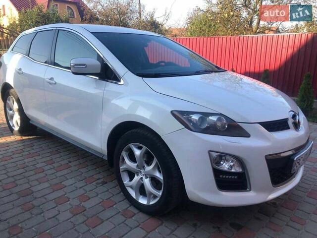 Белый Мазда СХ-7, объемом двигателя 2.49 л и пробегом 209 тыс. км за 10600 $, фото 18 на Automoto.ua