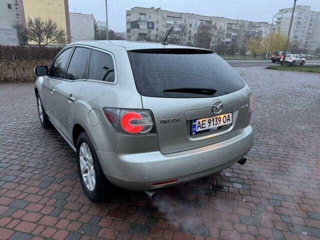 Бежевый Мазда СХ-7, объемом двигателя 2.3 л и пробегом 135 тыс. км за 7000 $, фото 4 на Automoto.ua