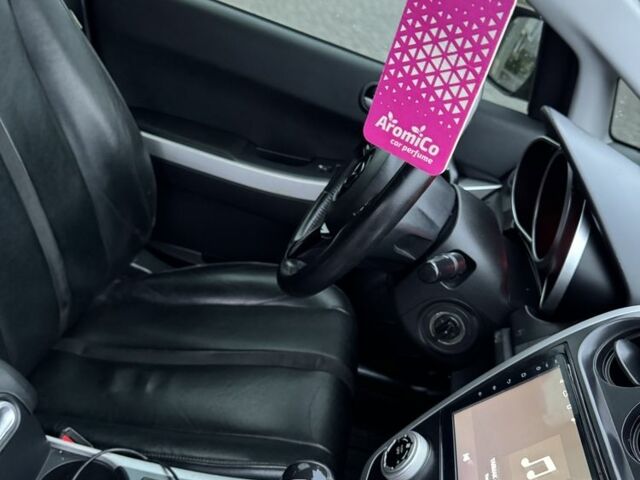 Бежевый Мазда СХ-7, объемом двигателя 2.3 л и пробегом 135 тыс. км за 7000 $, фото 7 на Automoto.ua