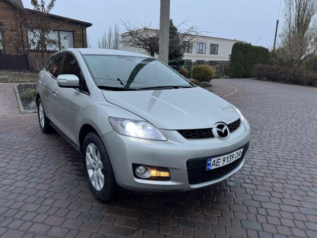 Бежевый Мазда СХ-7, объемом двигателя 2.3 л и пробегом 135 тыс. км за 7000 $, фото 1 на Automoto.ua