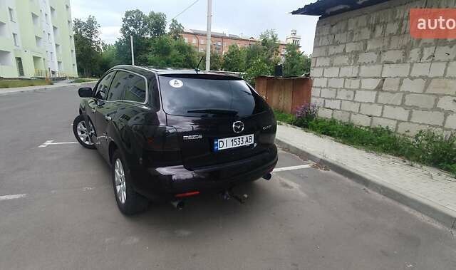 Черный Мазда СХ-7, объемом двигателя 2.26 л и пробегом 148 тыс. км за 6300 $, фото 12 на Automoto.ua