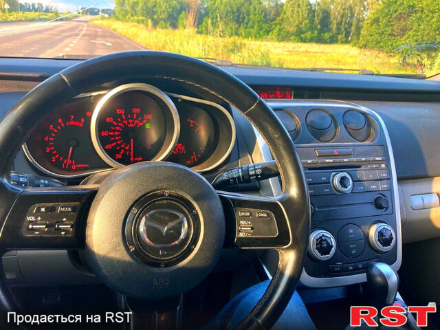Черный Мазда СХ-7, объемом двигателя 2.3 л и пробегом 240 тыс. км за 4750 $, фото 1 на Automoto.ua