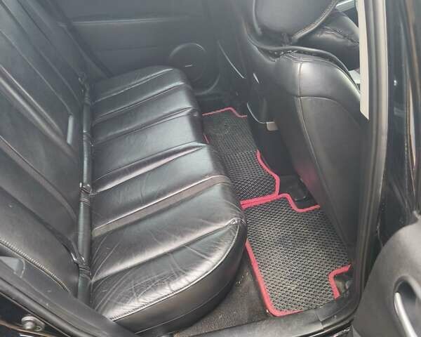 Черный Мазда СХ-7, объемом двигателя 2.26 л и пробегом 115 тыс. км за 7602 $, фото 6 на Automoto.ua