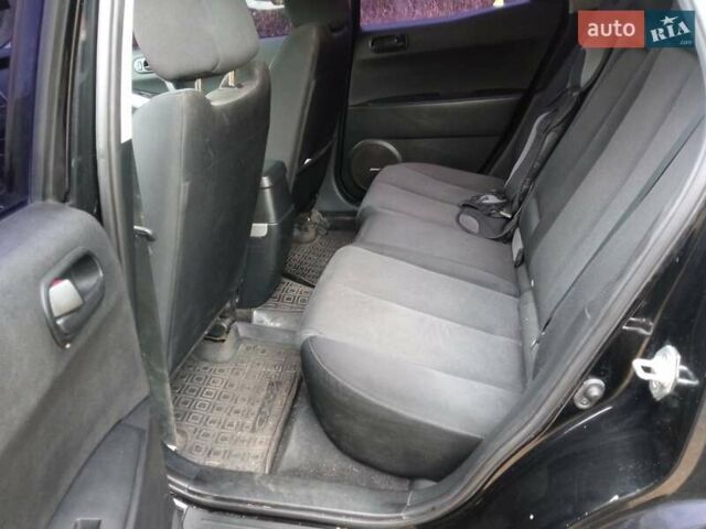 Черный Мазда СХ-7, объемом двигателя 2.26 л и пробегом 142 тыс. км за 7000 $, фото 1 на Automoto.ua