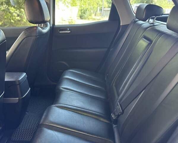 Черный Мазда СХ-7, объемом двигателя 2.26 л и пробегом 89 тыс. км за 8500 $, фото 5 на Automoto.ua