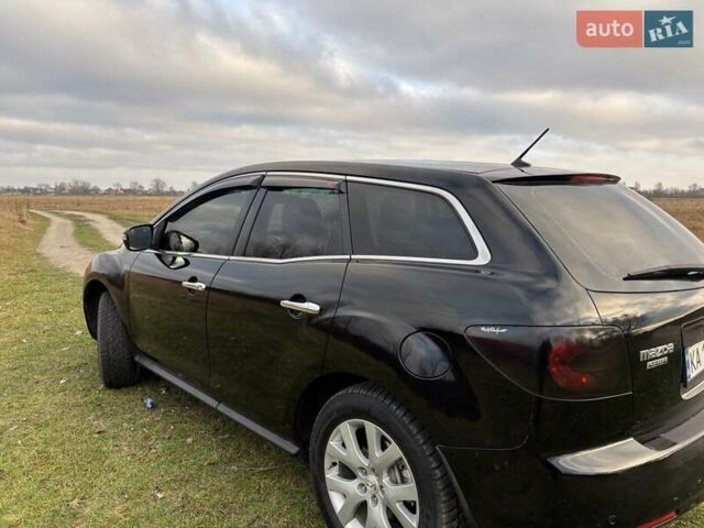 Черный Мазда СХ-7, объемом двигателя 2.26 л и пробегом 220 тыс. км за 7950 $, фото 39 на Automoto.ua