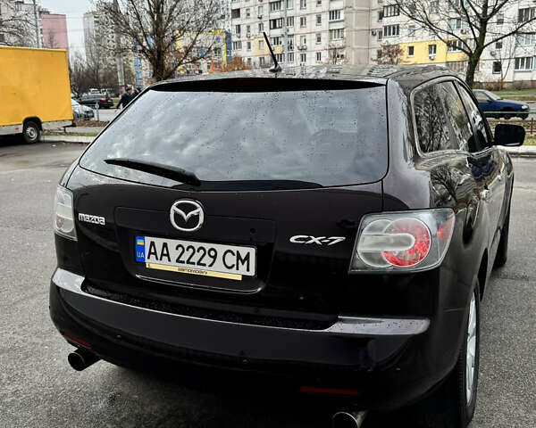 Черный Мазда СХ-7, объемом двигателя 2.3 л и пробегом 137 тыс. км за 7700 $, фото 1 на Automoto.ua