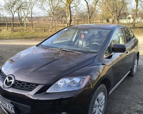 Черный Мазда СХ-7, объемом двигателя 2.26 л и пробегом 181 тыс. км за 5500 $, фото 3 на Automoto.ua