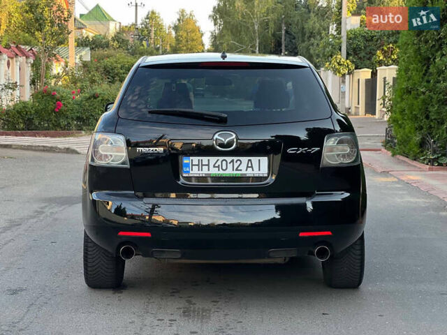 Чорний Мазда СХ-7, об'ємом двигуна 2.3 л та пробігом 147 тис. км за 6500 $, фото 18 на Automoto.ua