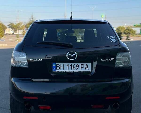 Черный Мазда СХ-7, объемом двигателя 2.3 л и пробегом 200 тыс. км за 6700 $, фото 1 на Automoto.ua