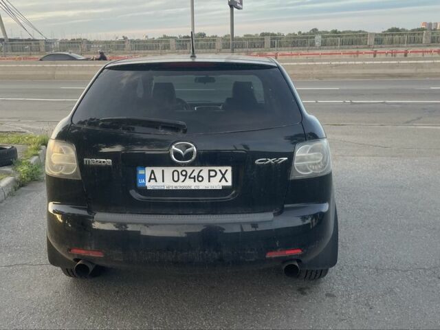 Черный Мазда СХ-7, объемом двигателя 2.3 л и пробегом 145 тыс. км за 6900 $, фото 2 на Automoto.ua