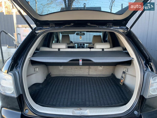 Чорний Мазда СХ-7, об'ємом двигуна 2.3 л та пробігом 230 тис. км за 7000 $, фото 4 на Automoto.ua