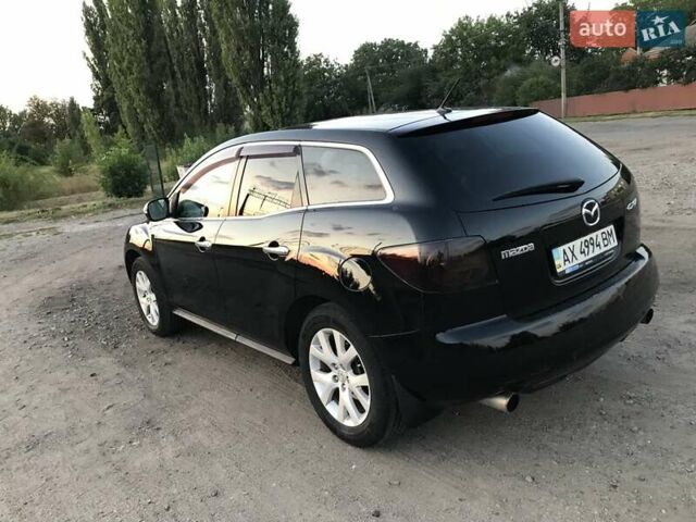Черный Мазда СХ-7, объемом двигателя 2.3 л и пробегом 242 тыс. км за 6500 $, фото 2 на Automoto.ua