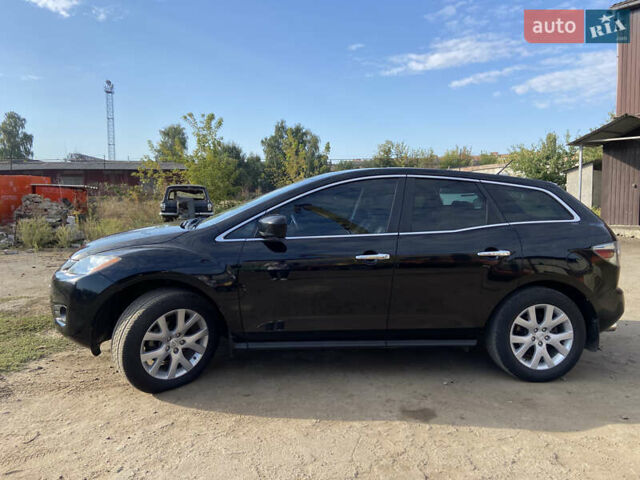 Черный Мазда СХ-7, объемом двигателя 2.3 л и пробегом 230 тыс. км за 6500 $, фото 2 на Automoto.ua