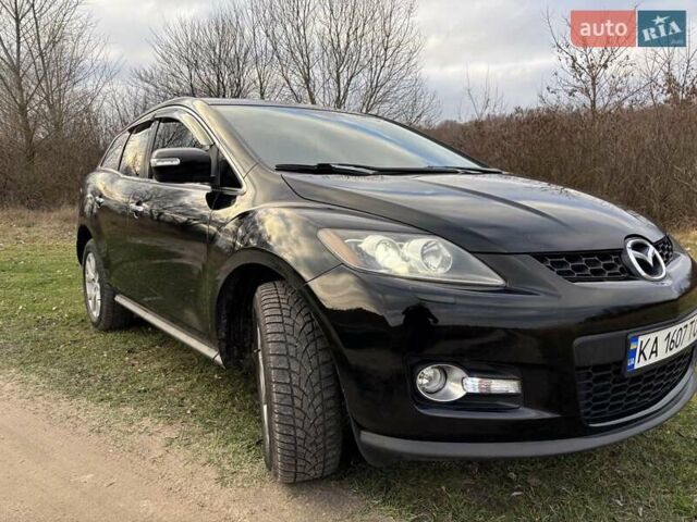 Черный Мазда СХ-7, объемом двигателя 2.26 л и пробегом 220 тыс. км за 7950 $, фото 27 на Automoto.ua