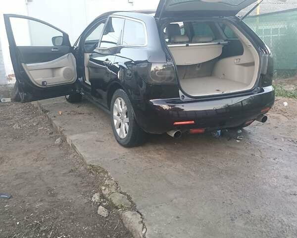 Черный Мазда СХ-7, объемом двигателя 2.3 л и пробегом 256 тыс. км за 6200 $, фото 9 на Automoto.ua
