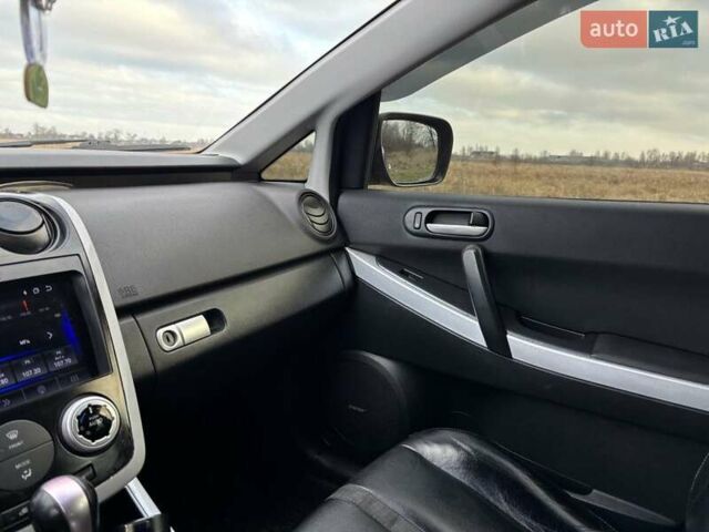 Черный Мазда СХ-7, объемом двигателя 2.26 л и пробегом 220 тыс. км за 7950 $, фото 69 на Automoto.ua