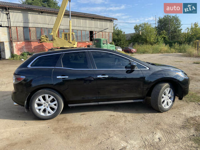 Черный Мазда СХ-7, объемом двигателя 2.3 л и пробегом 230 тыс. км за 6500 $, фото 3 на Automoto.ua
