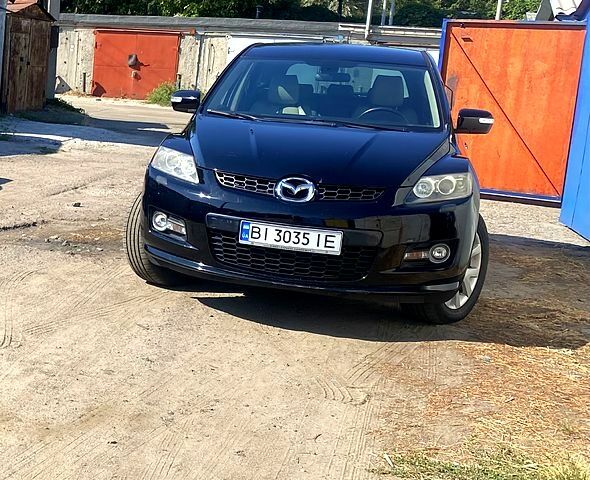 Черный Мазда СХ-7, объемом двигателя 2.3 л и пробегом 150 тыс. км за 2500 $, фото 1 на Automoto.ua