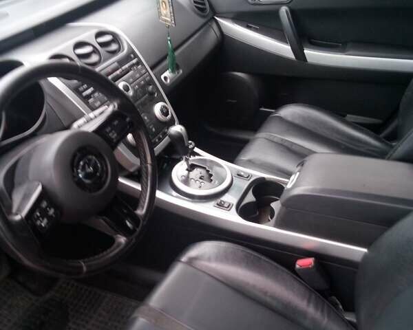 Черный Мазда СХ-7, объемом двигателя 2.26 л и пробегом 230 тыс. км за 7000 $, фото 4 на Automoto.ua