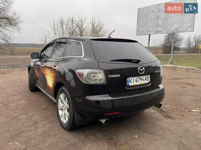 Черный Мазда СХ-7, объемом двигателя 2.3 л и пробегом 135 тыс. км за 7500 $, фото 2 на Automoto.ua