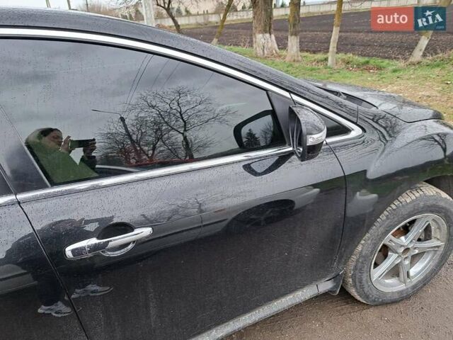 Черный Мазда СХ-7, объемом двигателя 2.3 л и пробегом 150 тыс. км за 7500 $, фото 3 на Automoto.ua