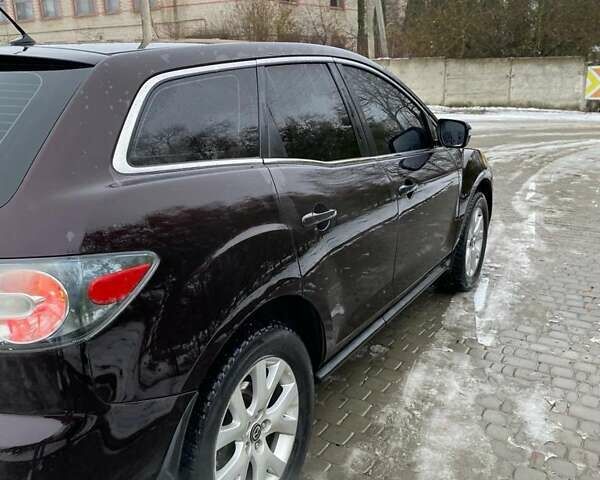 Черный Мазда СХ-7, объемом двигателя 2.3 л и пробегом 324 тыс. км за 7500 $, фото 4 на Automoto.ua