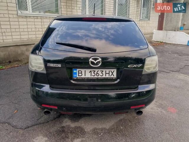 Черный Мазда СХ-7, объемом двигателя 2.3 л и пробегом 230 тыс. км за 7700 $, фото 17 на Automoto.ua