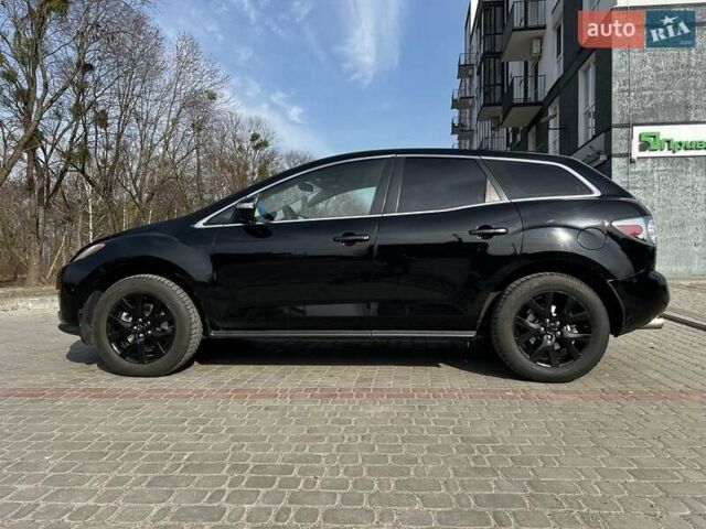 Черный Мазда СХ-7, объемом двигателя 2.3 л и пробегом 220 тыс. км за 7000 $, фото 2 на Automoto.ua