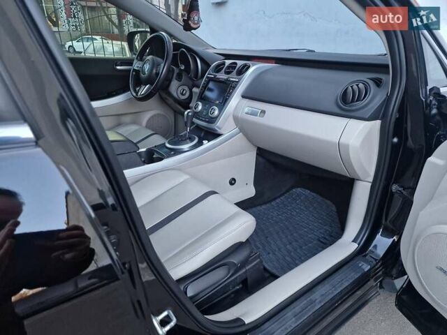Черный Мазда СХ-7, объемом двигателя 2.3 л и пробегом 115 тыс. км за 8990 $, фото 34 на Automoto.ua