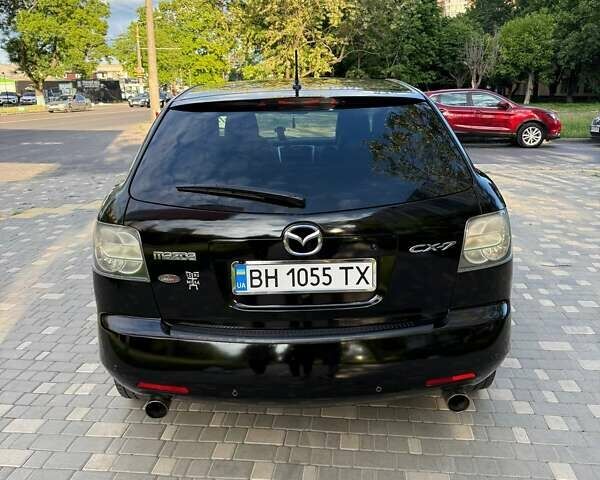 Черный Мазда СХ-7, объемом двигателя 2.3 л и пробегом 105 тыс. км за 8500 $, фото 3 на Automoto.ua