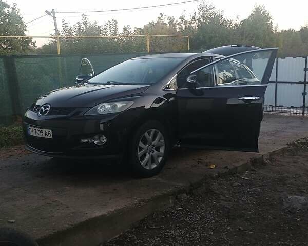 Черный Мазда СХ-7, объемом двигателя 2.3 л и пробегом 256 тыс. км за 6200 $, фото 12 на Automoto.ua