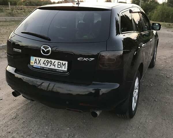 Черный Мазда СХ-7, объемом двигателя 2.3 л и пробегом 242 тыс. км за 6500 $, фото 3 на Automoto.ua