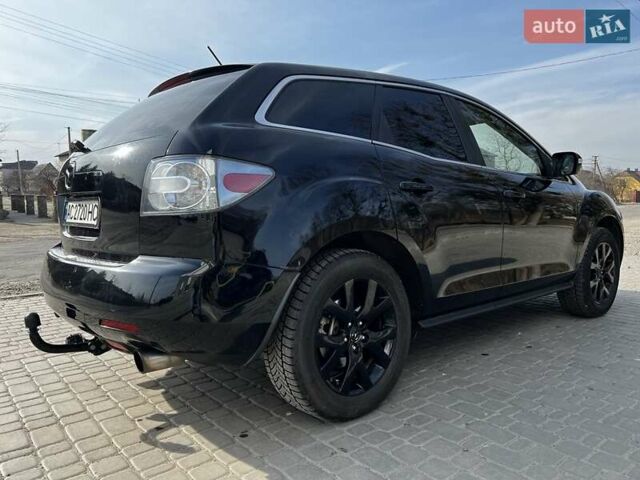 Черный Мазда СХ-7, объемом двигателя 2.3 л и пробегом 220 тыс. км за 7000 $, фото 1 на Automoto.ua