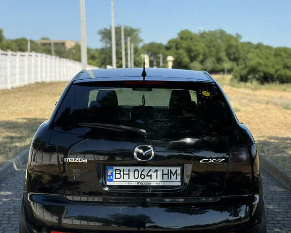 Черный Мазда СХ-7, объемом двигателя 2.3 л и пробегом 143 тыс. км за 6600 $, фото 8 на Automoto.ua