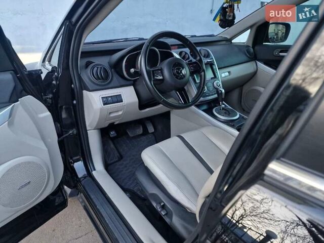 Черный Мазда СХ-7, объемом двигателя 2.3 л и пробегом 115 тыс. км за 8990 $, фото 29 на Automoto.ua