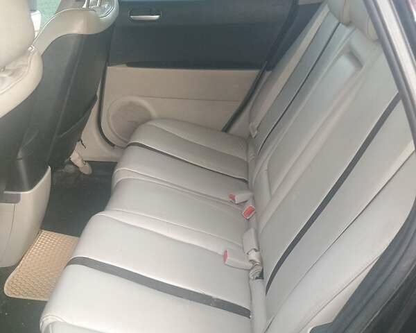 Черный Мазда СХ-7, объемом двигателя 2.3 л и пробегом 256 тыс. км за 6200 $, фото 2 на Automoto.ua
